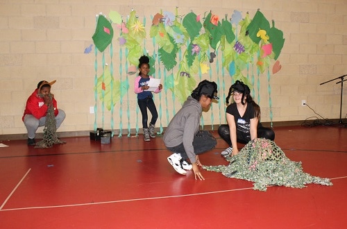 Students performing play