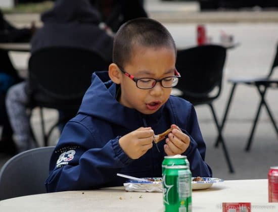 Child eating at Radio Block Party