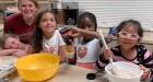 Elementary students baking